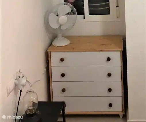 alcove with chest of drawers in the bedroom