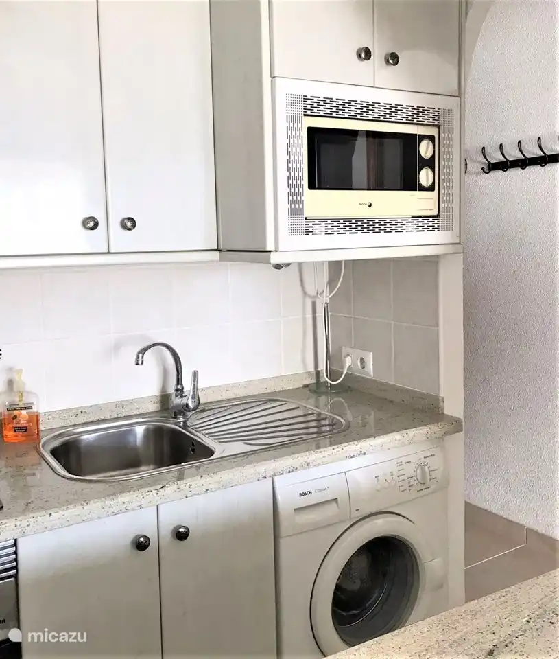 There is also a separate microwave and a washing machine. Please bring your own beach towels and hand towels. a load of laundry is done in no time