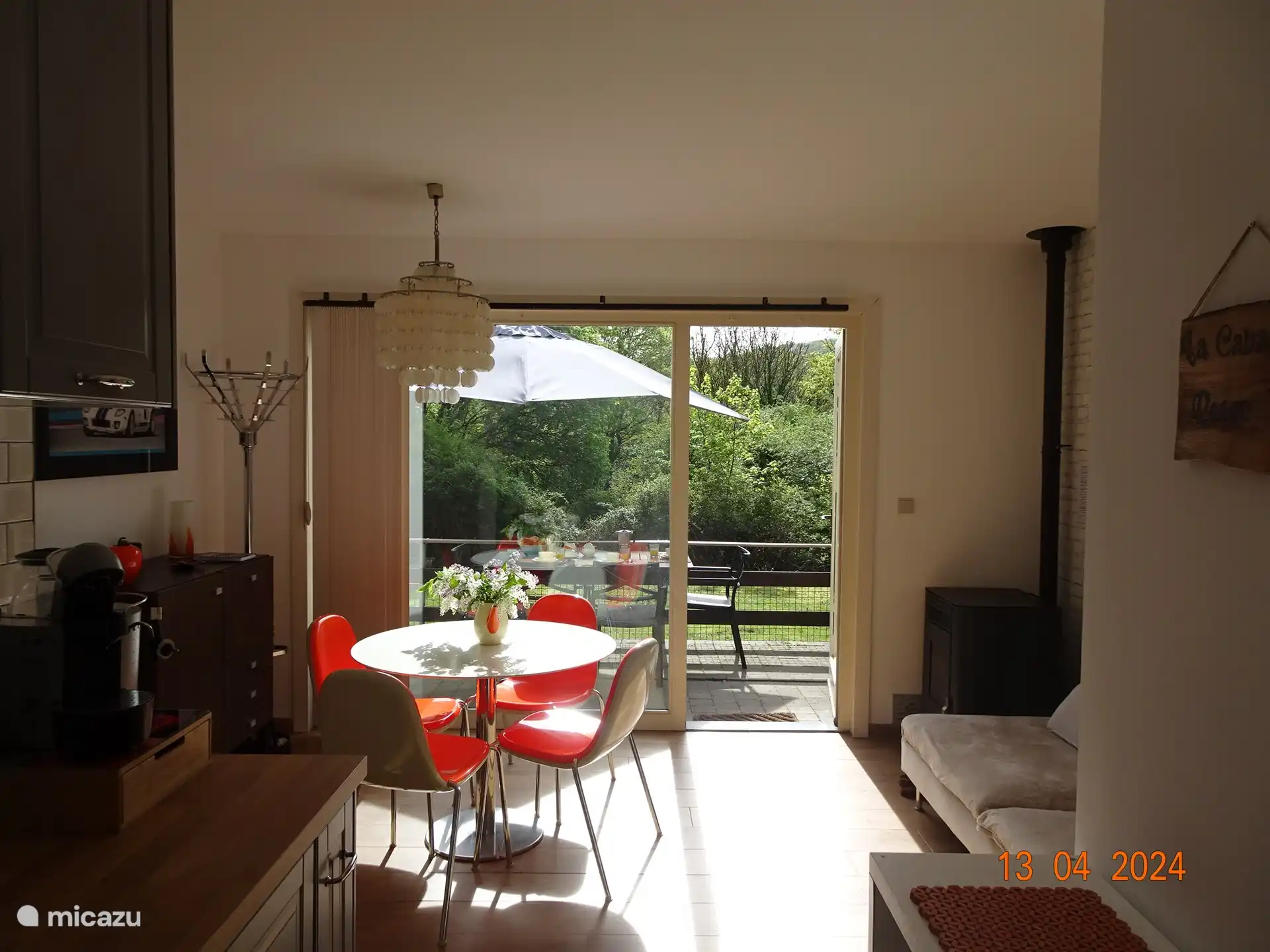 The living room with a view from the kitchen