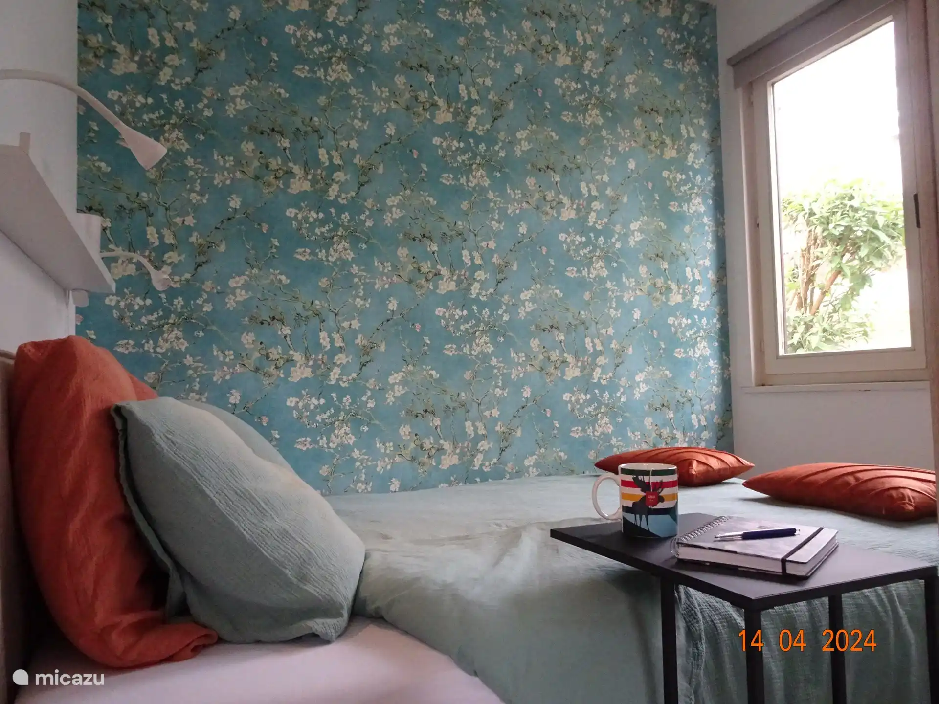 Relax in the master bedroom with a coffee and a book and a view of nature