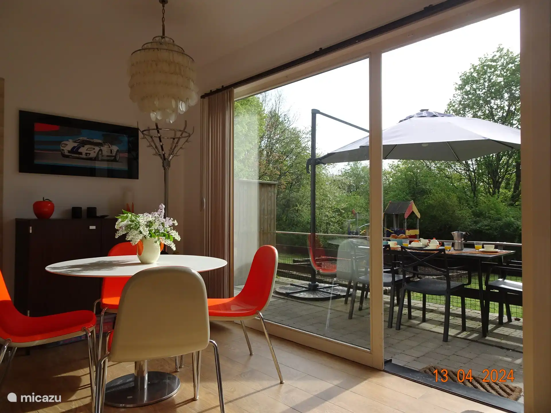 The living room with a view of the terrace