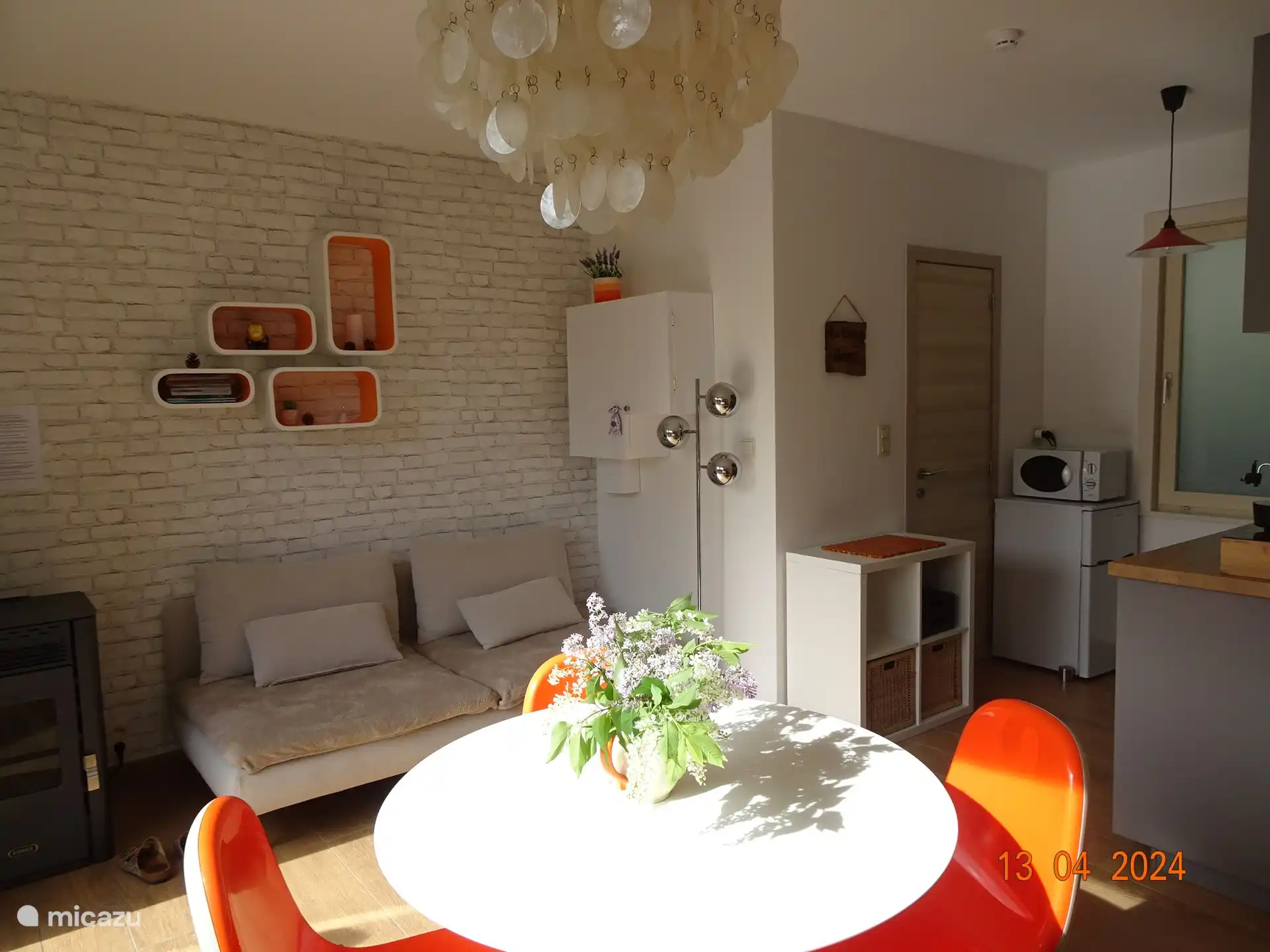 The living room with a view of the sofa and reading corner