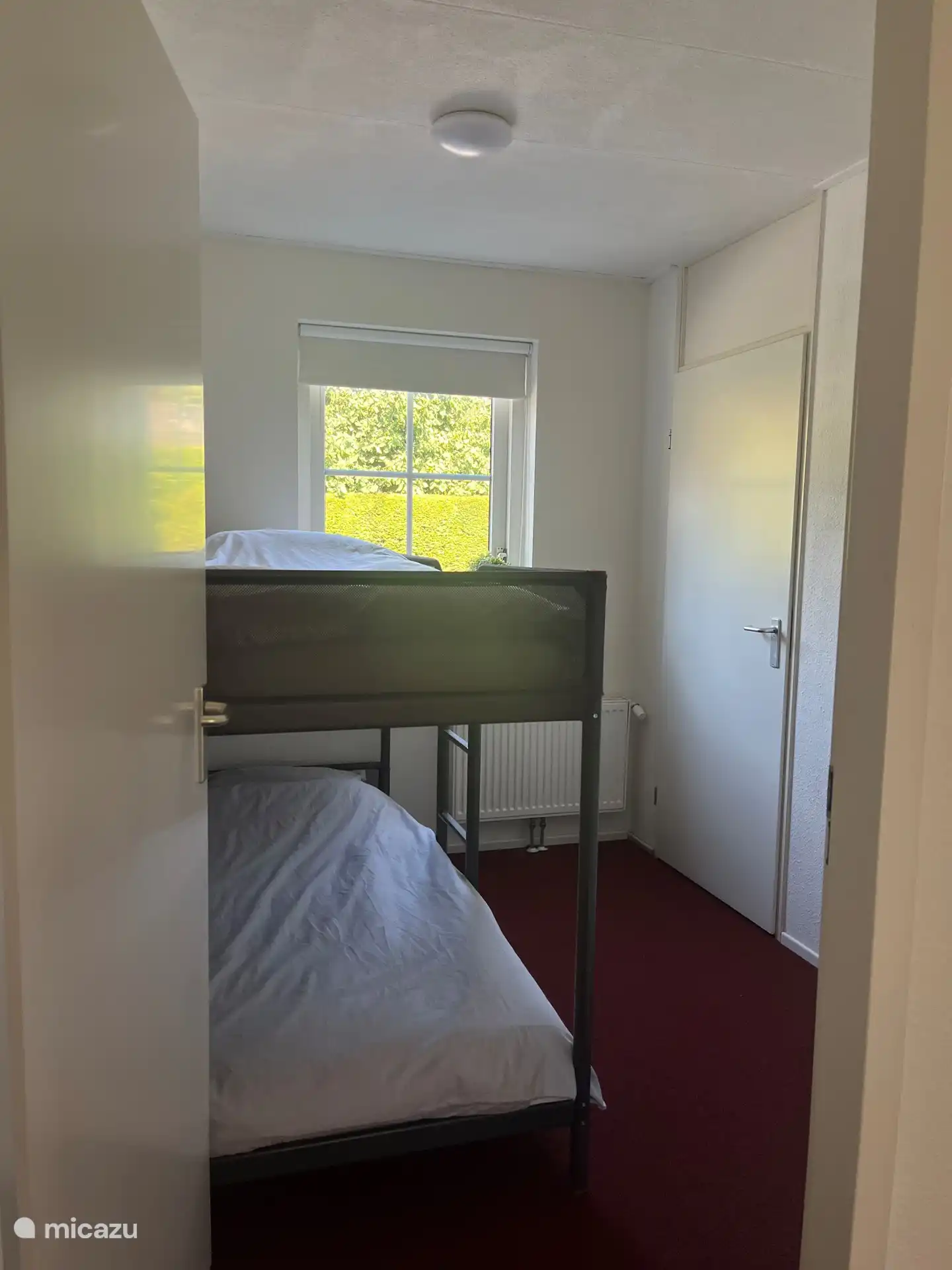 Das zweite Schlafzimmer mit einem Etagenbett.