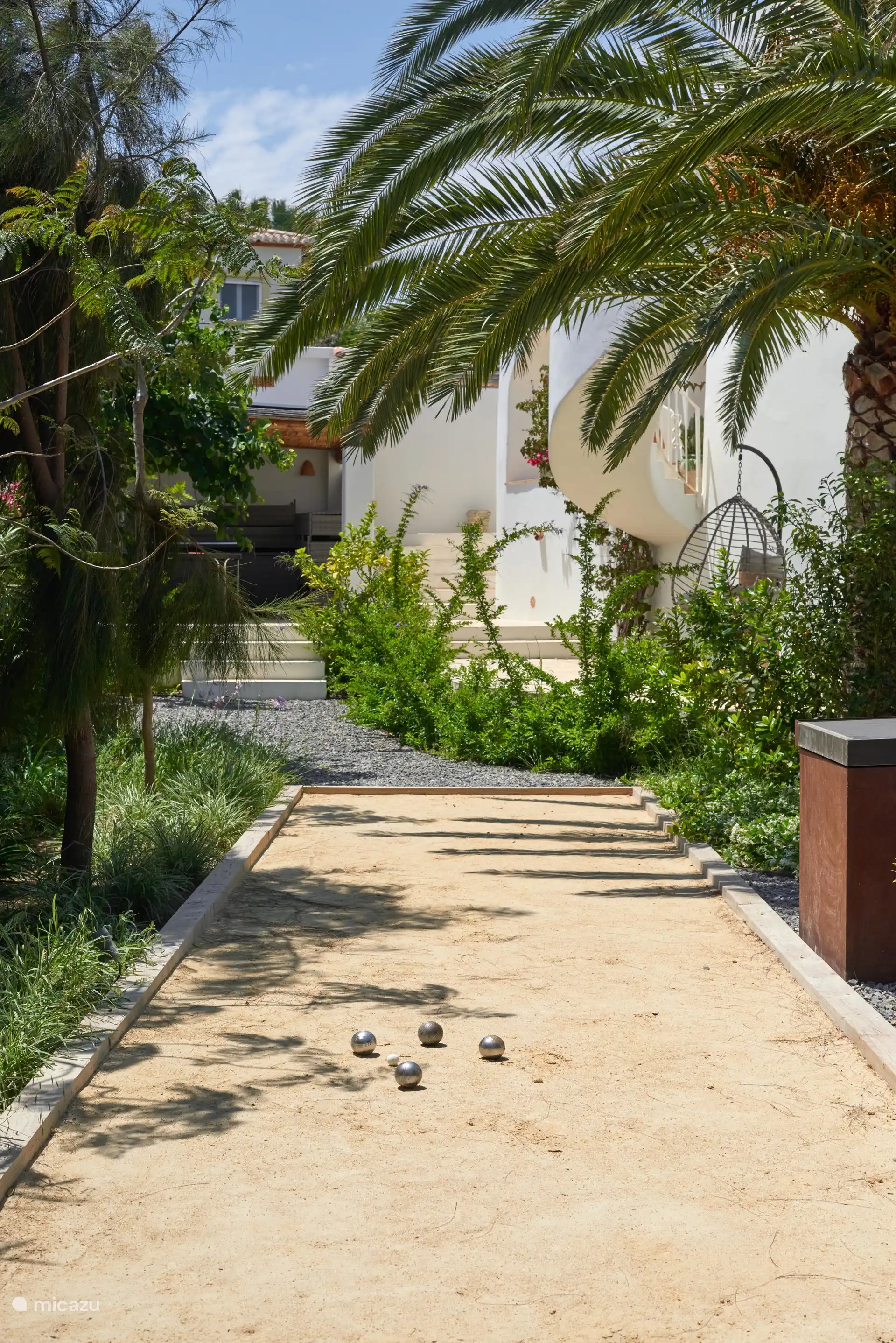 In the garden is a Jeu de Boule court
