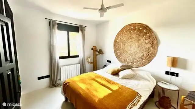 Bedroom 1st floor in &#39;Ibiza style&#39;. All bedrooms have air conditioning and a fan and shutters