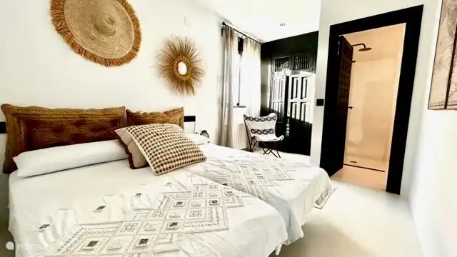 Upstairs bedroom in Ibiza style (two single beds).