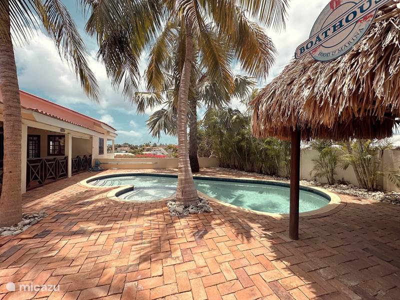 Vakantiehuis Curaçao, Banda Ariba (oost), Cas Grandi Studio Sylvie Resort - Studio aan zwembad