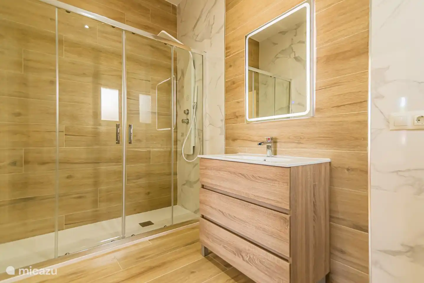 This bathroom belongs to bedroom 1