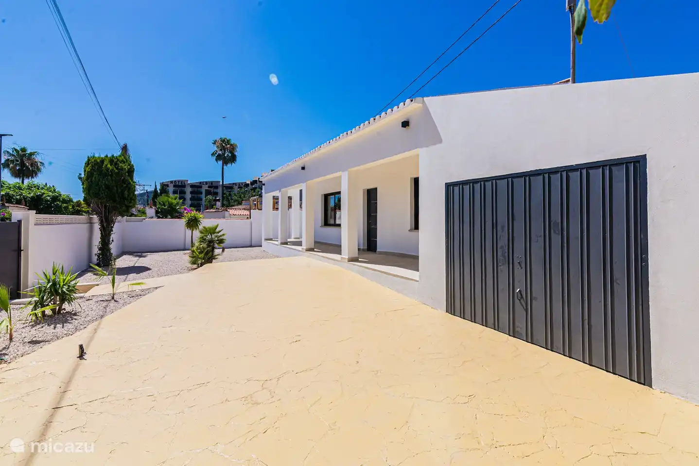 This is the front of the house, where the grace is also located. In the garage there are electric bicycles, washing machine &amp; dryer.