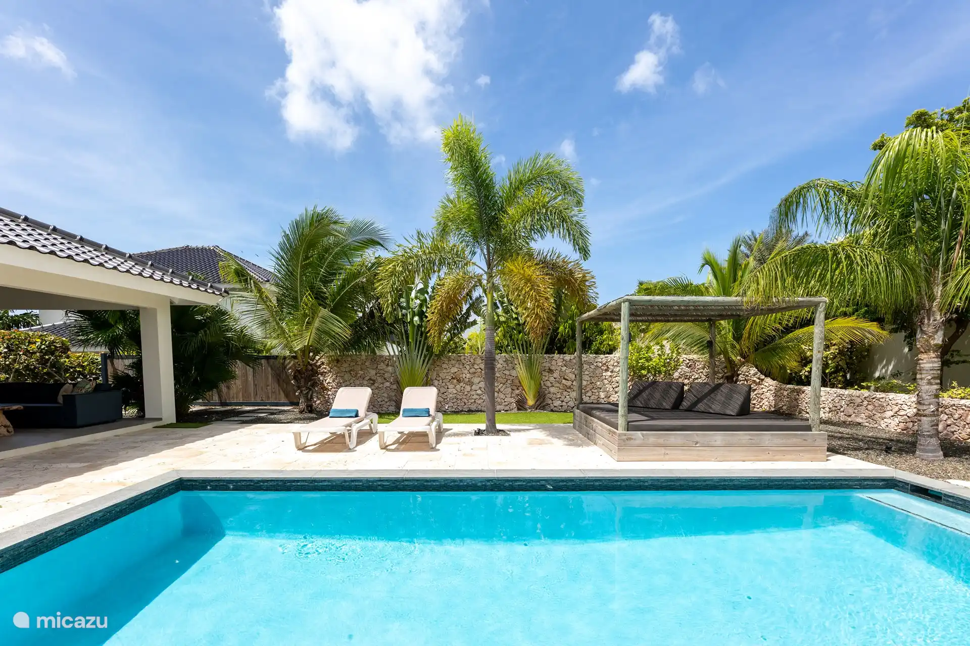 In addition to the loungers, there is also a Gazebo, a lovely, covered, large lounger!!