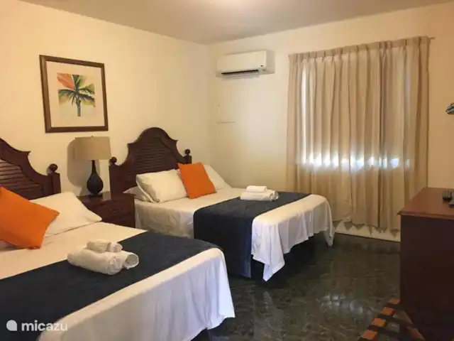appartement huren in Aruba, Paradera, Paradera – La Felicidad Aruba- Sonrisa Di Aruba slaapkamer met 2 bedden