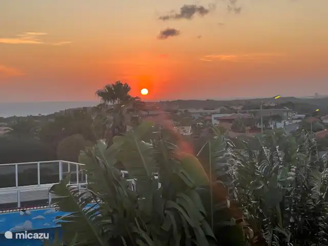 Villa Bunita Bista (Mooi uitzicht) huren in Curaçao, Banda Ariba (oost), Jan Thiel - villa Vanaf de veranda elke avond een hele mooie zonsondergang.
