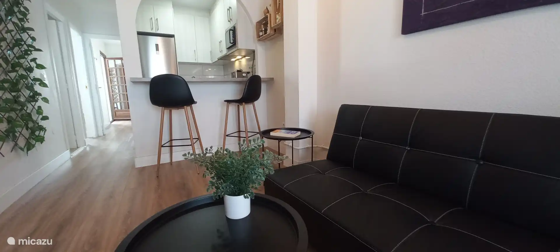 The diner is linked to the living room.