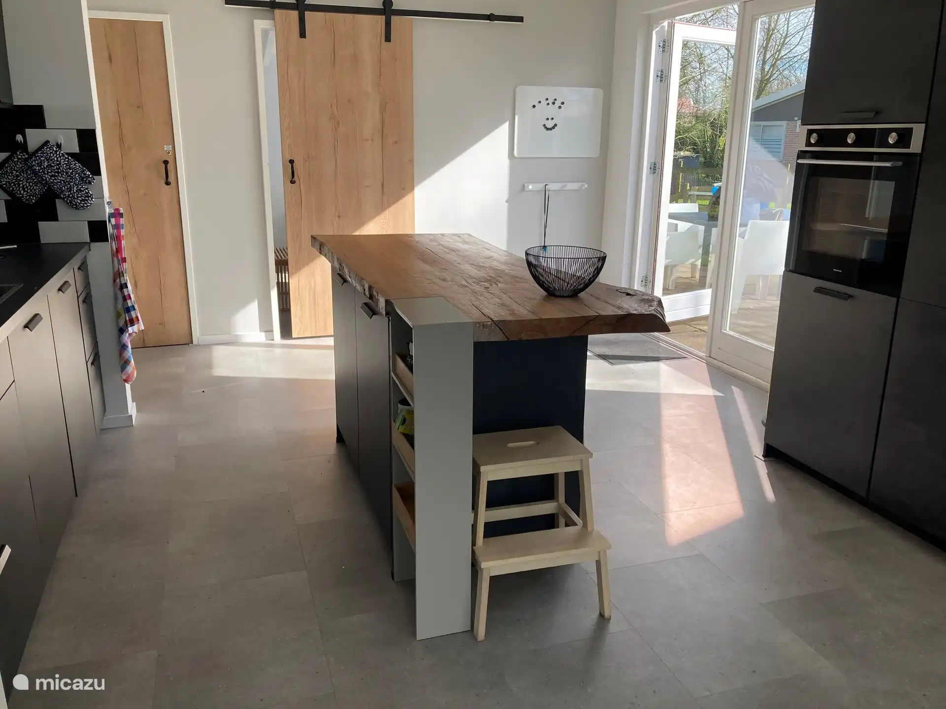 The kitchen with combination microwave