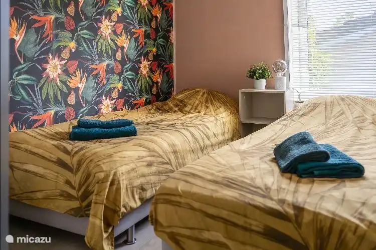 Chambre avec 2x lits simples