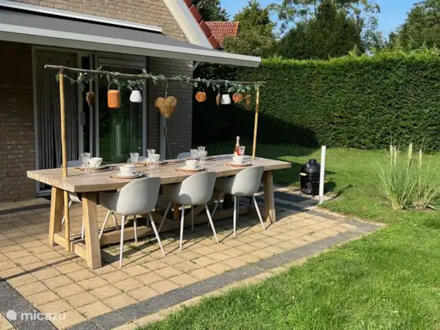 Villa Junio Rosy en Países Bajos, Güeldres, Wijchen - casa vacacional Acogedora mesa de jardín
