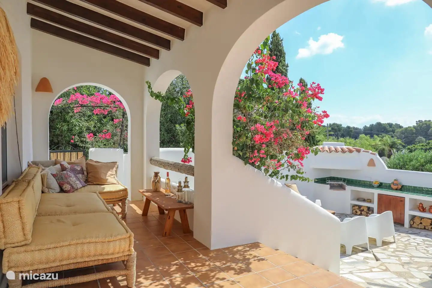 Take a seat on the lovely lounge sofa in the shade