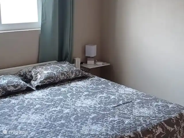 appartement huren in Aruba, Zuidoost-Aruba, San Nicolas – Cas Fontein Groot 2 persoonsbed met airco in de slaapkamer