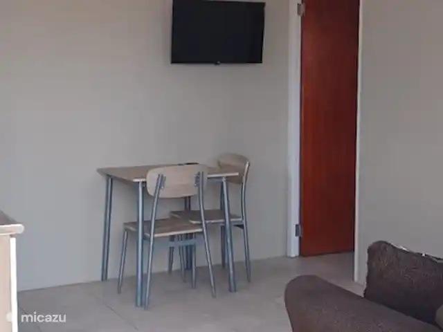 appartement huren in Aruba, Zuidoost-Aruba, San Nicolas – Cas Fontein Geniet van uw ontbijt of diner bij onze eethoekje