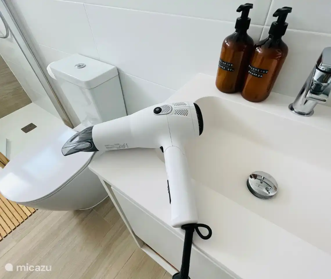 Bathroom 1 with walk-in shower.