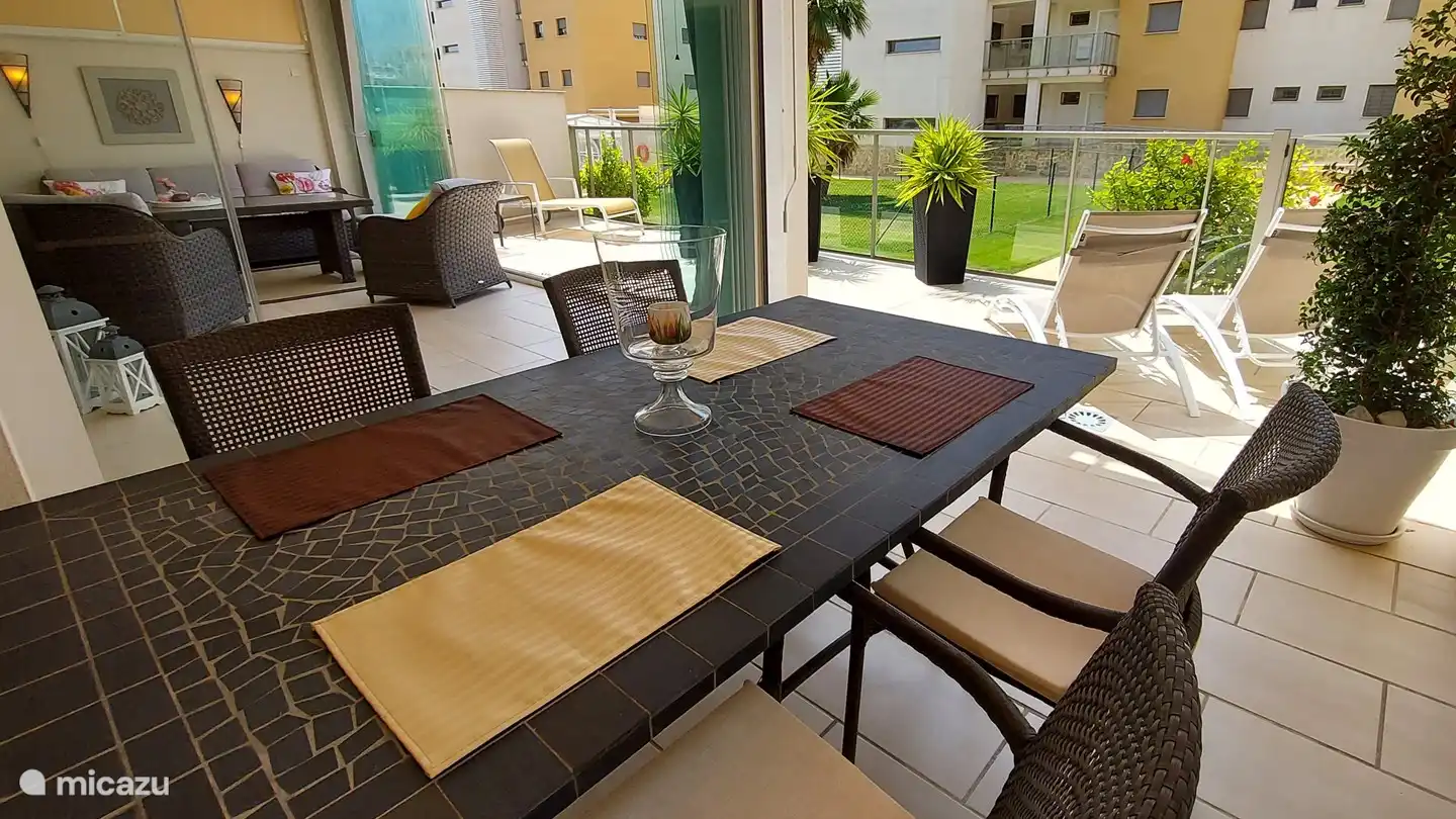 side view of part of terrace, with outdoor dining table