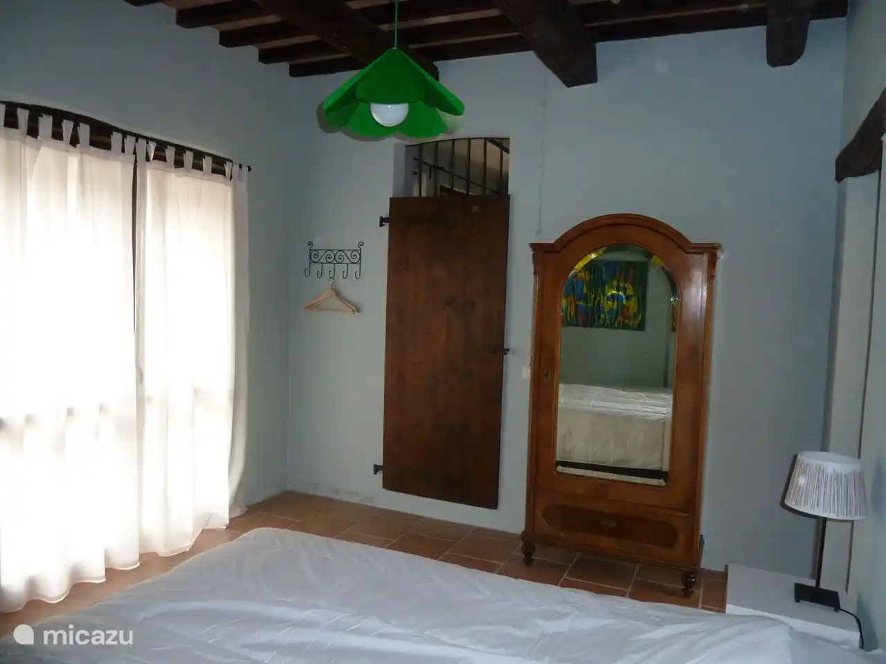 Schlafzimmer im Erdgeschoss mit Klimaanlage