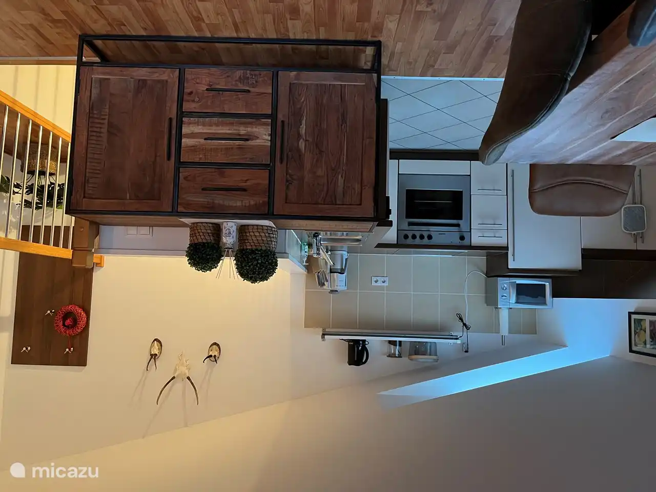 Living room on the first floor with open kitchen