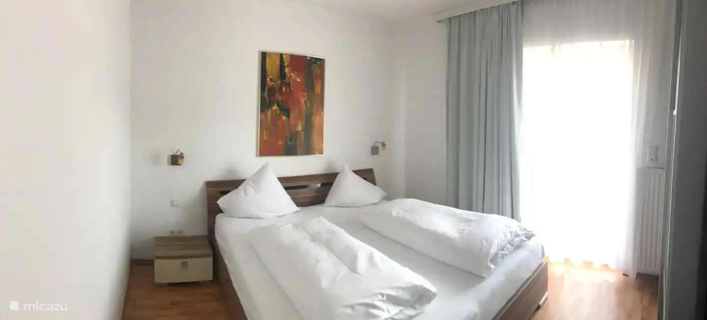 Bedroom 2 with wardrobe and safe.