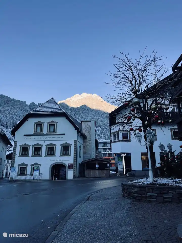 The krippenmuseum in the village. Located almost next to the apartment. This is the view from the bus stop. Waiting for the bus in front of the door that will take you to Schlick 2000 in 5 minutes Right next to the Krippenmuseum is the tourist office. Useful for information about activities during your holiday.
