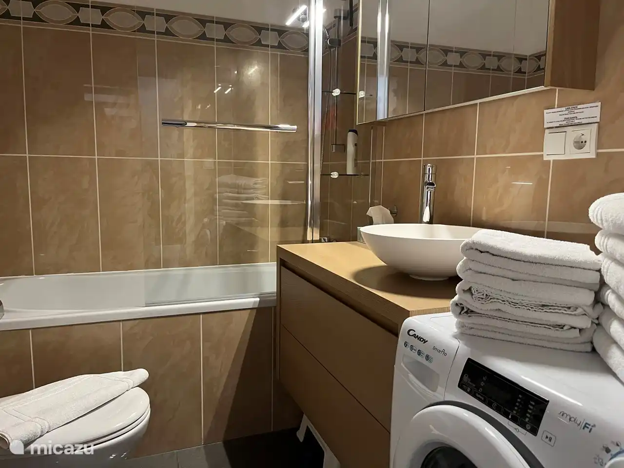 Spacious storage options in the bathroom furniture. Hairdryer available.