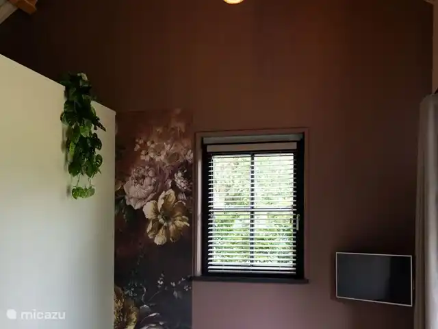 Le rêveur | Pays-Bas, Brabant-Septentrional,  Wilbertoord - maison de vacances Coin salon confortable avec de jolis fauteuils, dont une télévision connectée. Vue sur le grand jardin.
