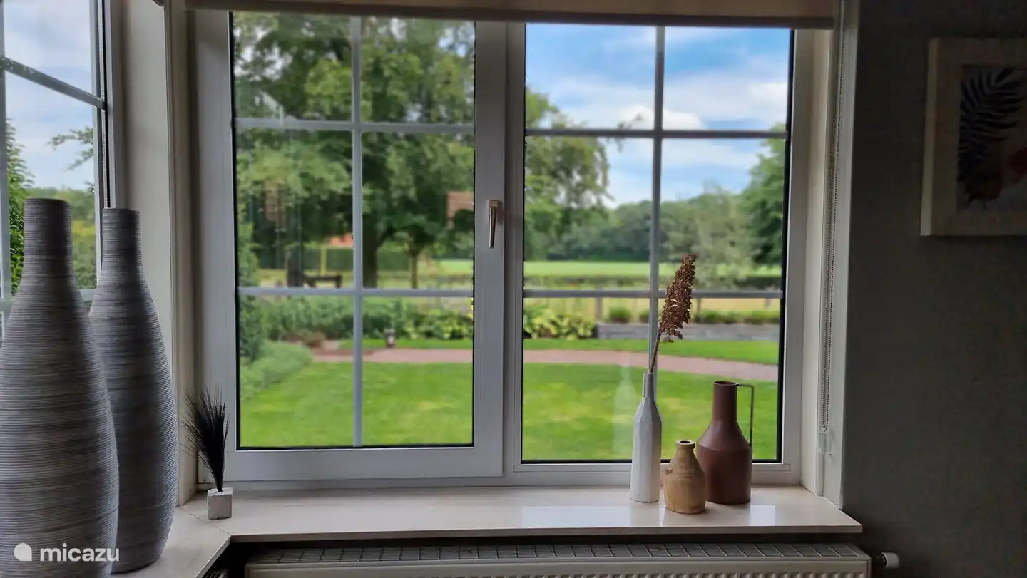 Wide view from the living room of the garden and the meadows, also a fantastic picture in winter when it snows!