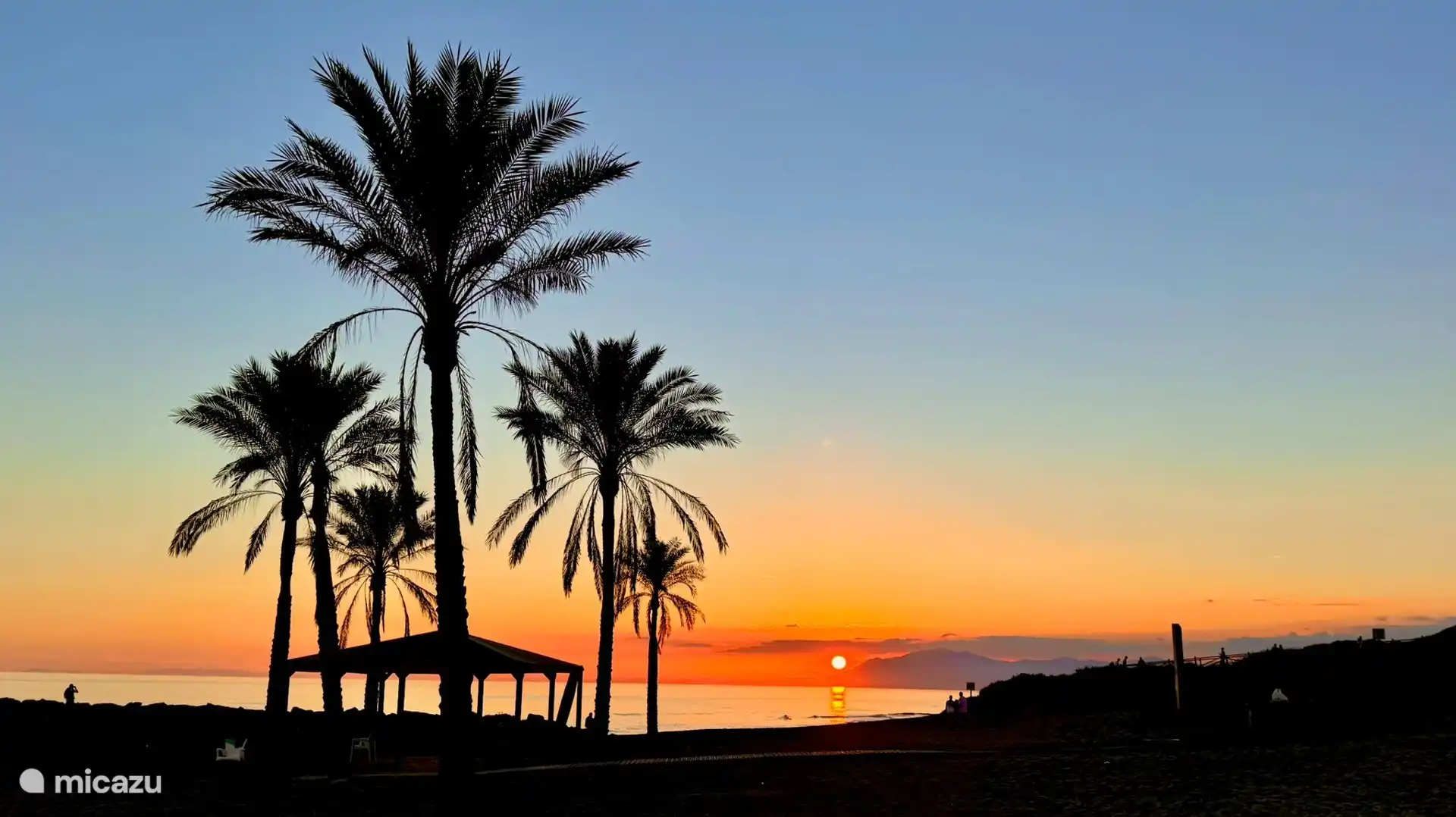 Beautiful sunset at Andy's beach bar, walking distance from our house 