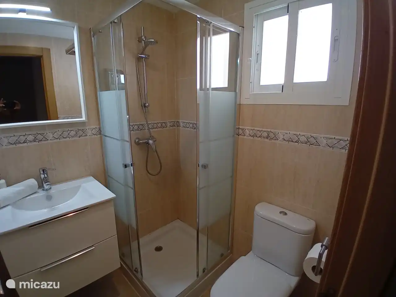 Bathroom 1 is adjacent to the master bedroom.