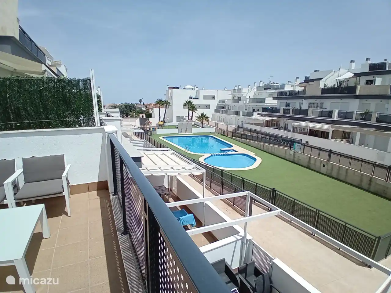 View from the terrace of the communal swimming pool.