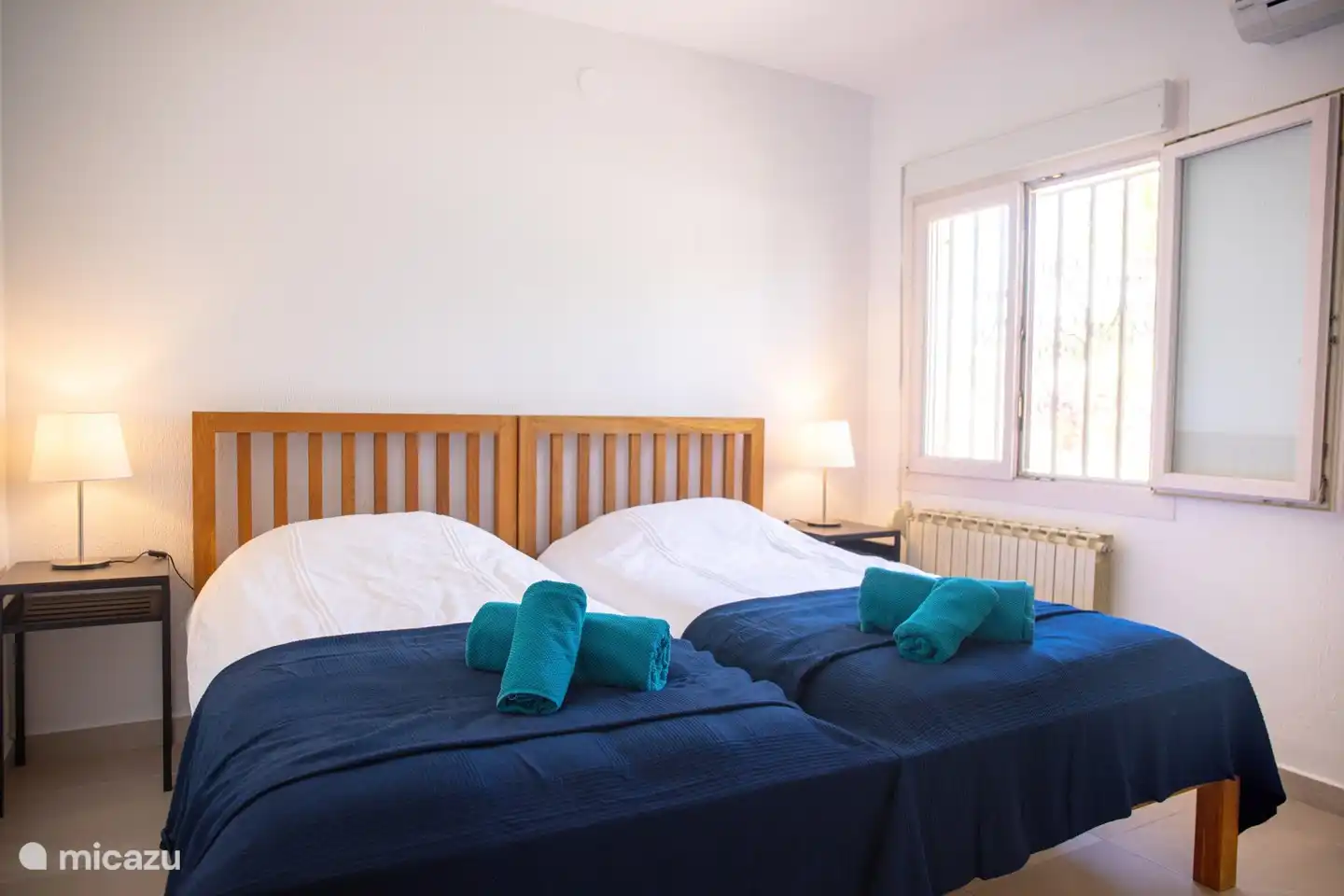 Schlafzimmer mit bequemen Betten