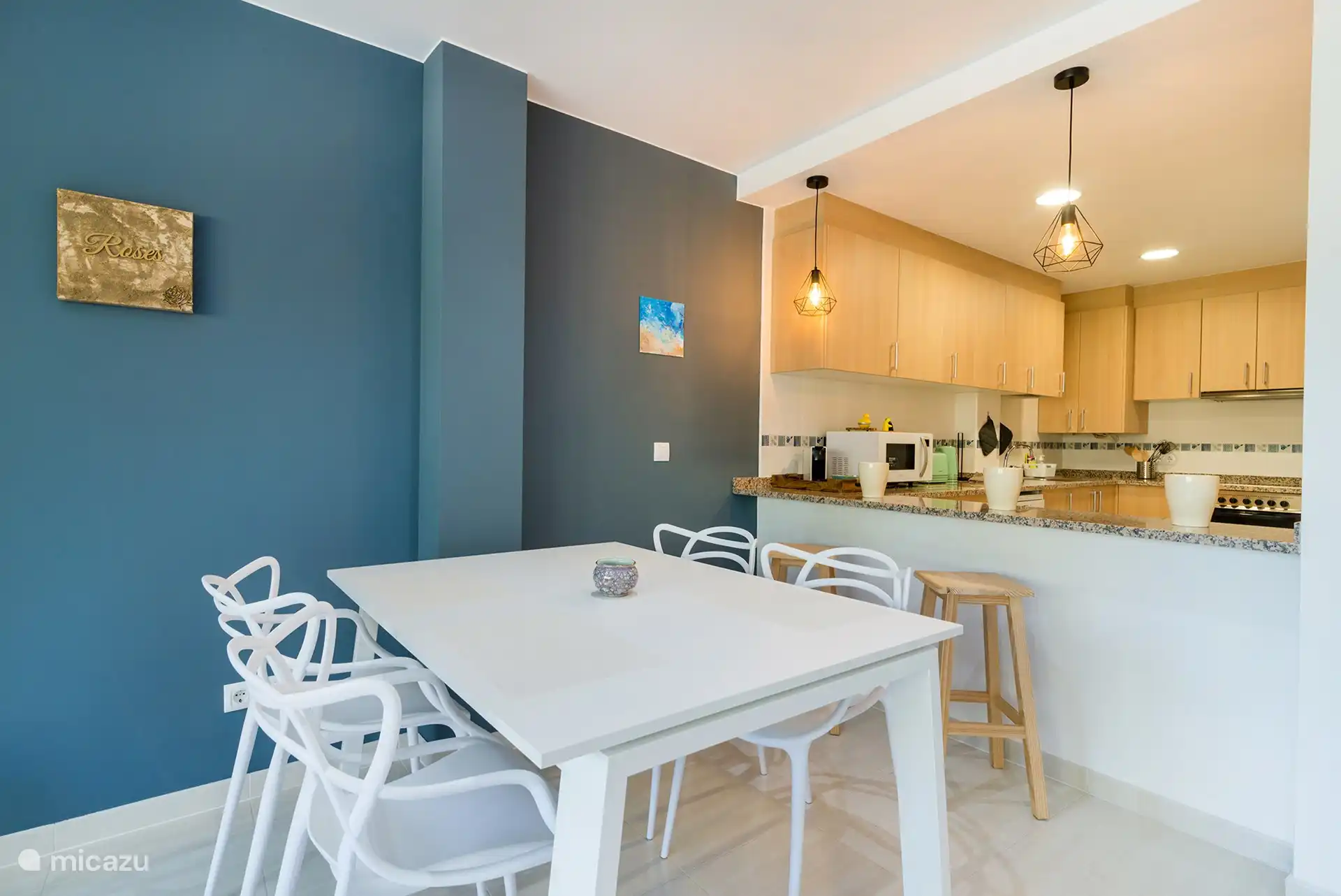 Dining table with open kitchen