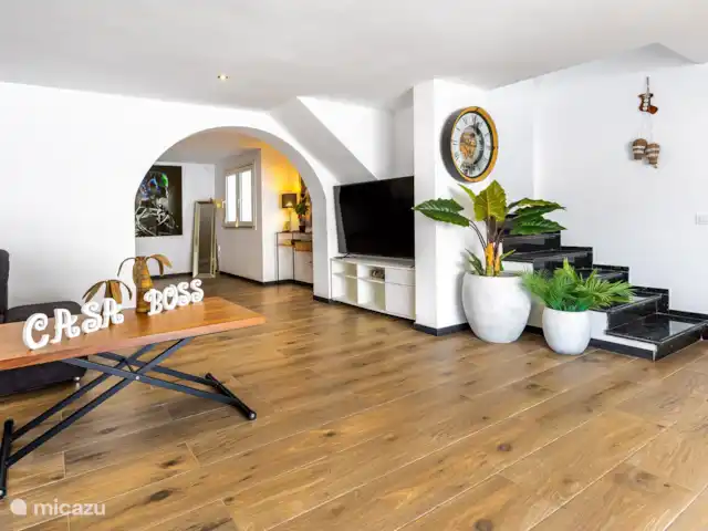 villa huren in Spanje, Gran Canaria, Puerto Rico – Moderne villa met zwembad Woonkamer met TV en bank