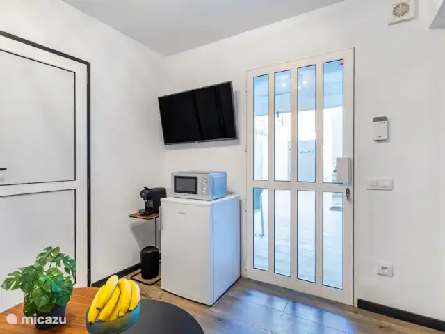 villa huren in Spanje, Gran Canaria, Puerto Rico – Moderne villa met zwembad Studio met TV en slaapbank