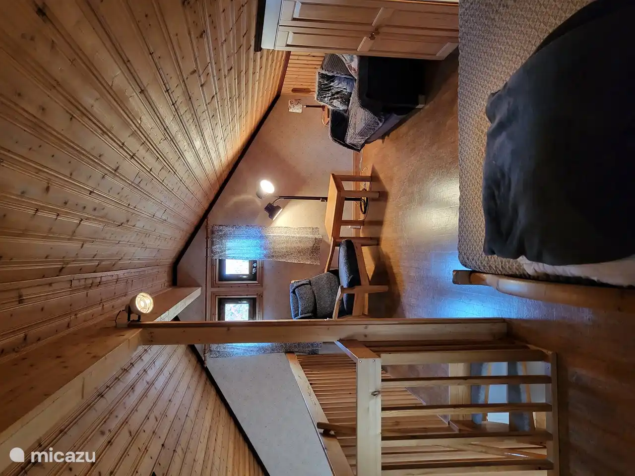 Zona de estar y sofá cama Vide