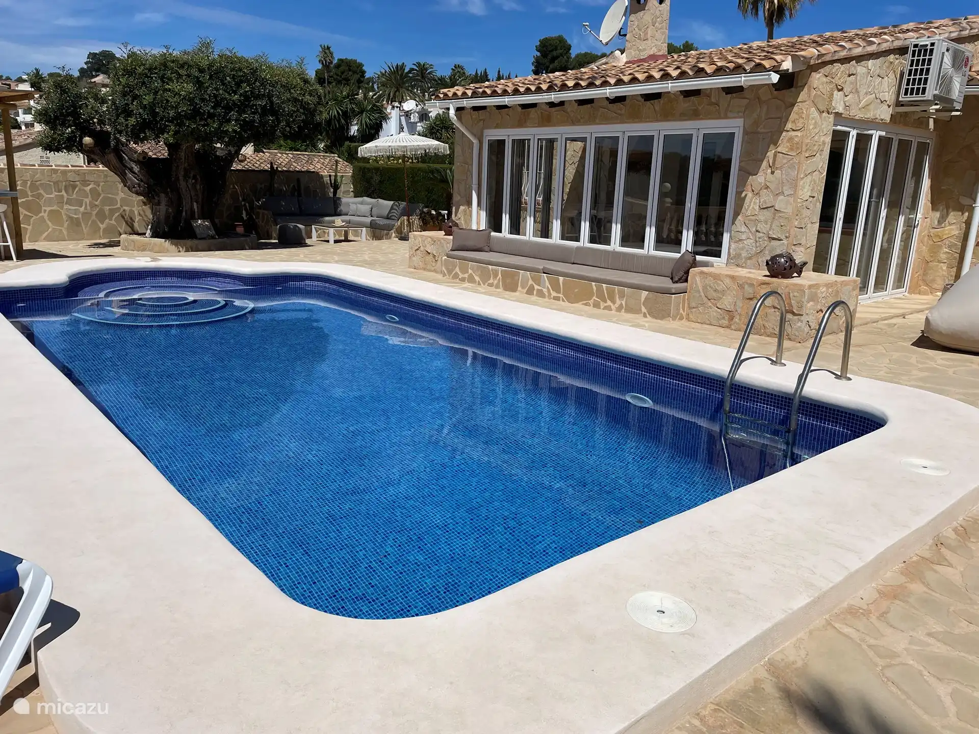 Terrace with pool bench and beanbags