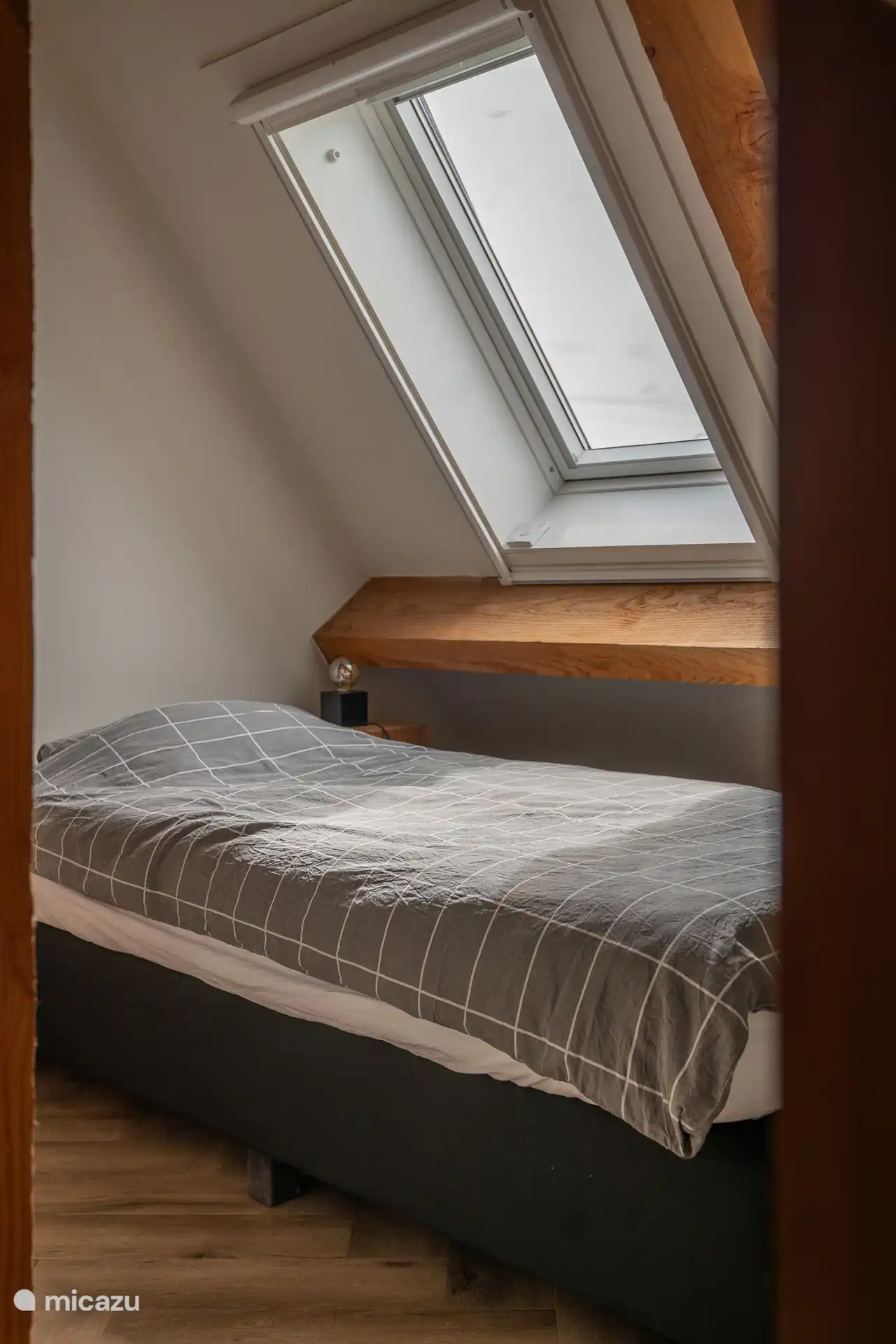 Dormitorio 2 con 1 cama individual.