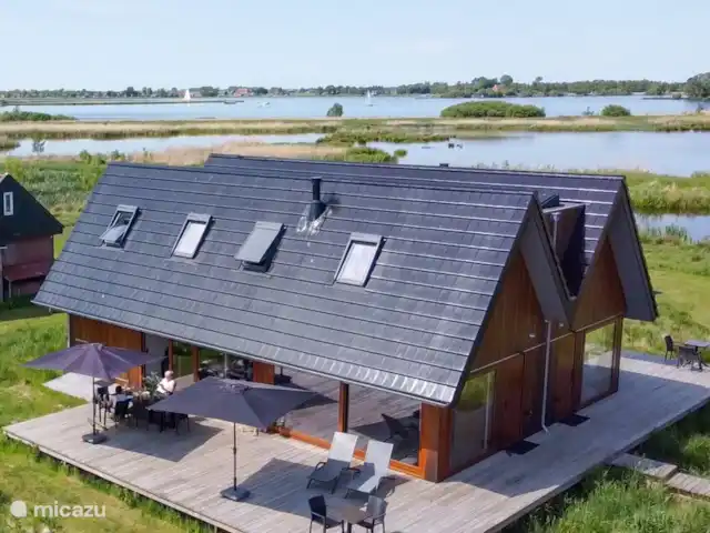 Domaine Âld Heach Hiem 14 personnes | Pays-Bas, Frise, Goëngahuizen - maison de vacances La maison de vacances mitoyenne à côté d'une maison de vacances récemment construite