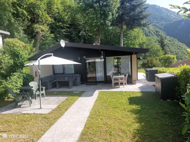 Casa La Moka | Italie, Lac de Garde, Tignale - bungalow Un joli jardin pour s’asseoir.