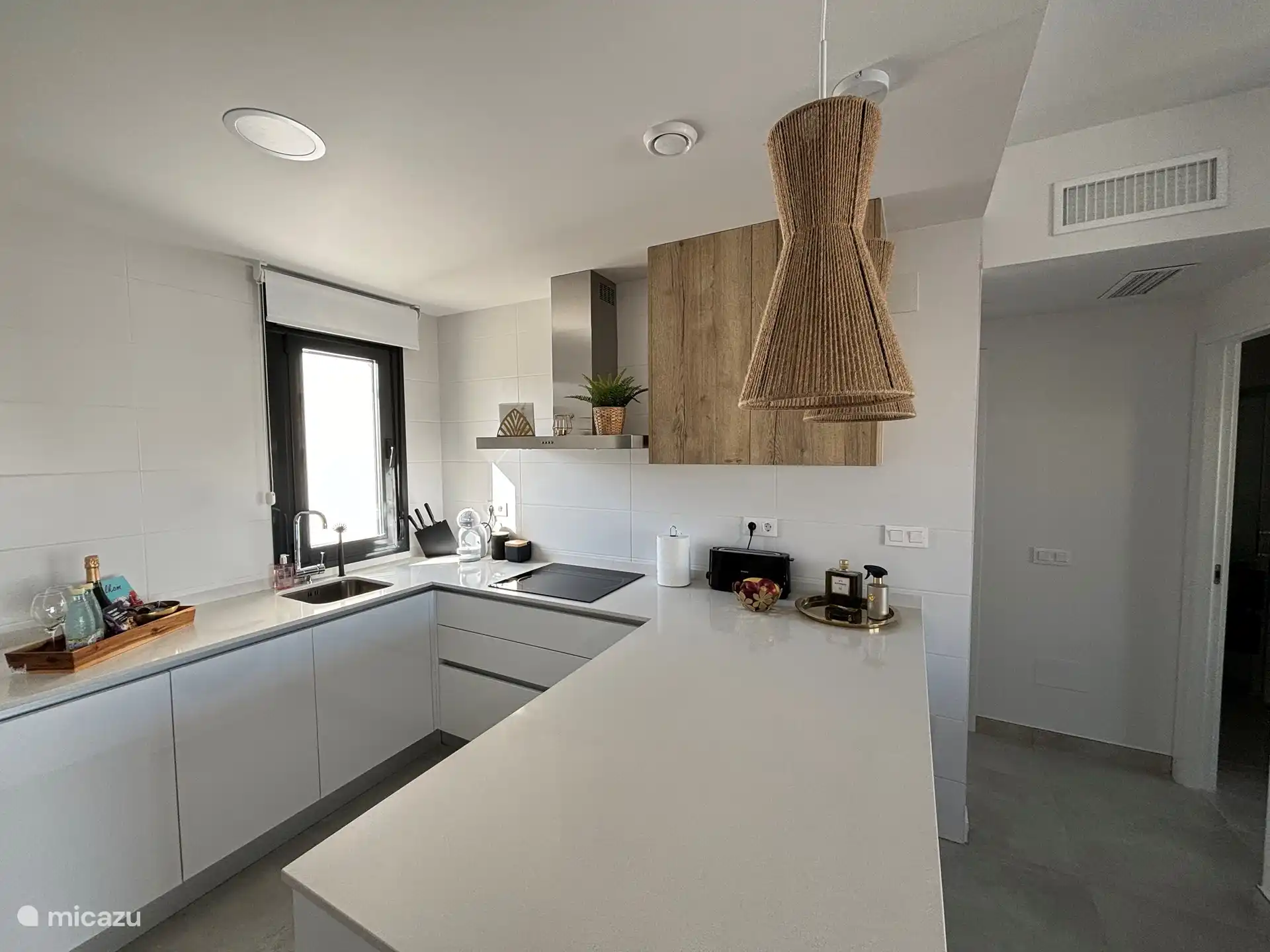 Kitchen with beautiful hanging lamps 