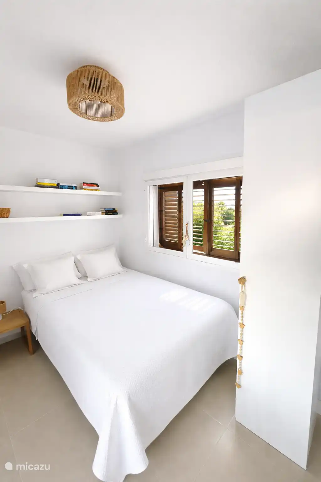 De derde kleinere slaapkamer, bed 160 x 200.