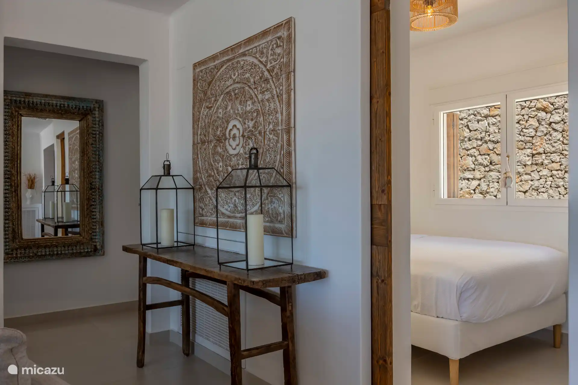 Small bedroom with sliding door, adjacent to the living room
