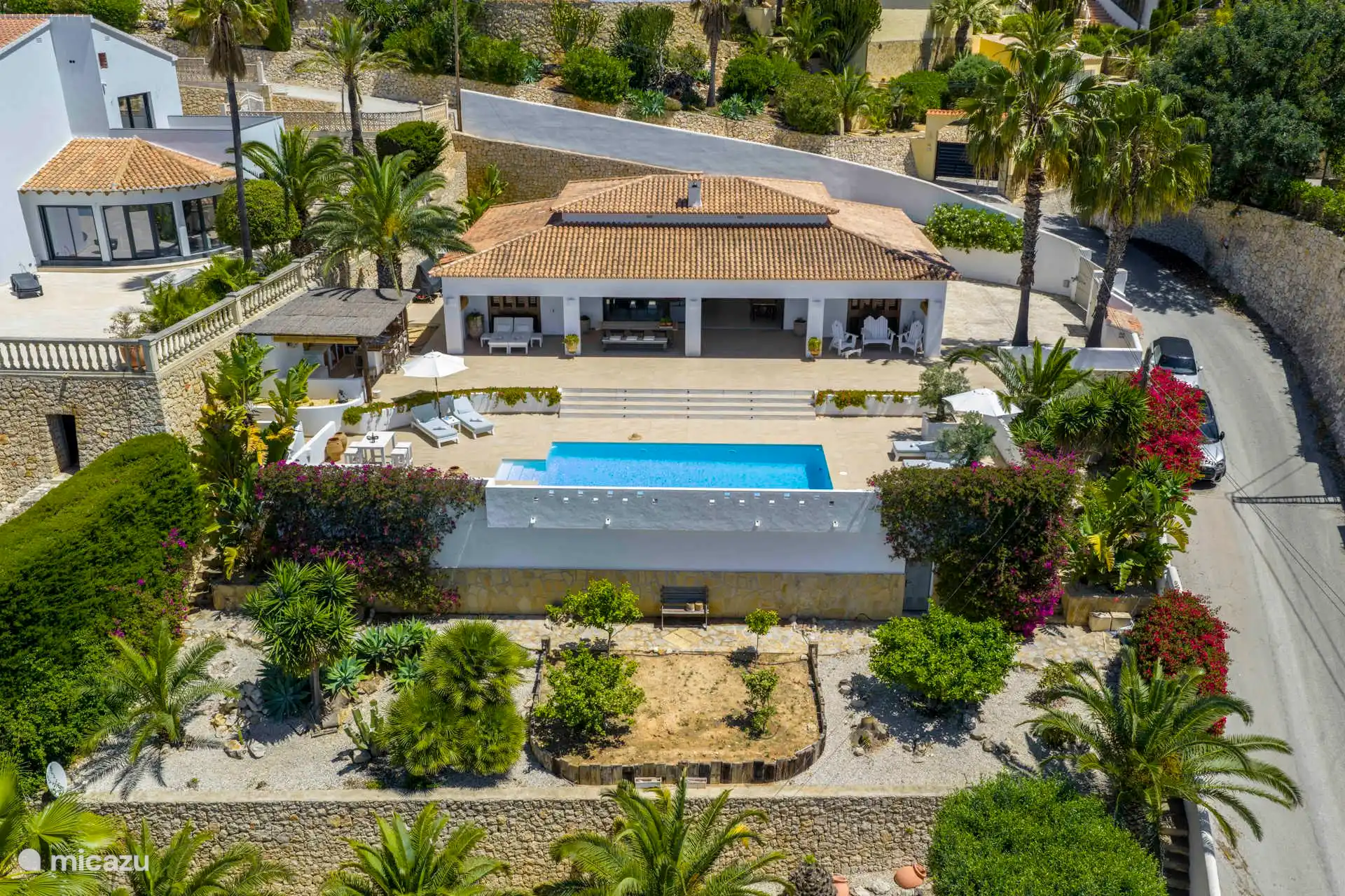 Overview of the house and the two lower lying associated plots.