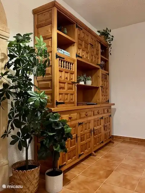 A traditional Spanish cupboard. Here you will find books, games and drawing supplies.