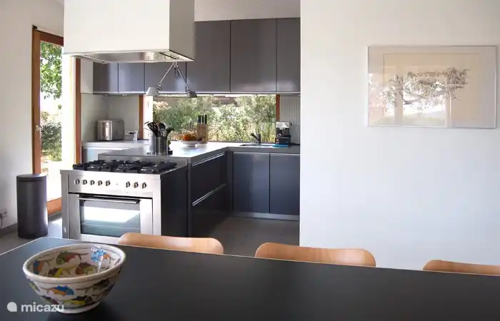 The modern kitchen is very well equipped including an American fridge with icemaker, dishwasher, microwave, bread maker, espresso machine, steam engine. And in the scullery you will find a washing machine, a dryer and a sink.